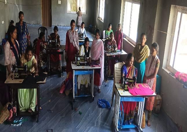 Women learning tailoring in Vanasamakhya’s skill development programme