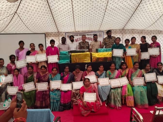 Women participants with training certificates